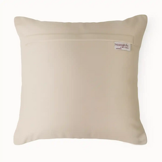 Half n Half Cushion Cover: Back view of the cushion cover, showing the smooth, plain cream/beige fabric and quality tag.