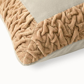 Close-up of the Jhalak cushion showing the intricate texture of the hand-gathered peach ruffles against ivory velvet.