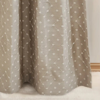 Hem detail of Heermoti Curtain highlighting embroidered motifs and neat finish.