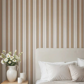 Bedroom styled with Heritage Beige & Cream Stripe Wallpaper Roll, featuring alternating beige and cream vertical stripes paired with a soft-toned bed and side table decor.
