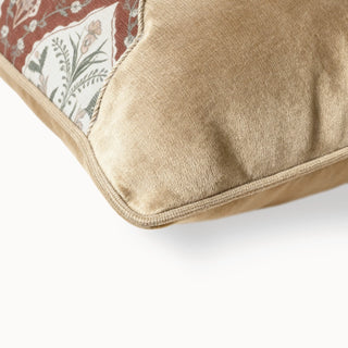 Close-up of the Heritage Tie Cushion corner showing the tan velvet panel and piping.