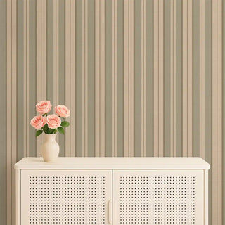 Heritage Olive & Beige Stripe Wallpaper Roll on a living room wall, styled with a console table, floral vase, and soft lighting for a warm interior look.