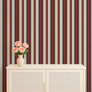 Living room with Heritage Red & Cream Stripe Wallpaper styled with a white cabinet and a vase of pink roses.