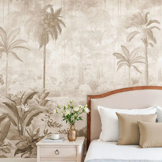 A luxury bedroom featuring the Hidden Grove sepia mural behind a bed with neutral and tan cushions.