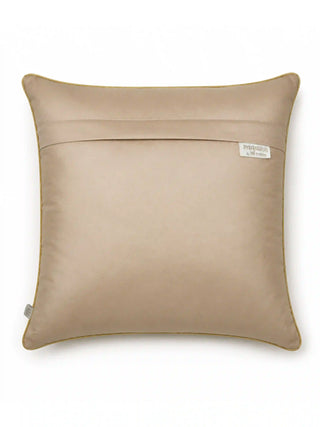The reverse side view of the Hiranya cushion cover showing the clean gold fabric backing, hidden zipper closure, and brand woven tag.
