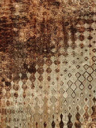 Detailed macro shot of Ikat Fusion Industrial wall art displaying oxidized rust tones and diamond weave textures.