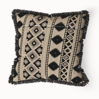 A back view of the "Ikkat Fringes" cushion cover, displaying its full square shape and the layered texture of the fringed edge.