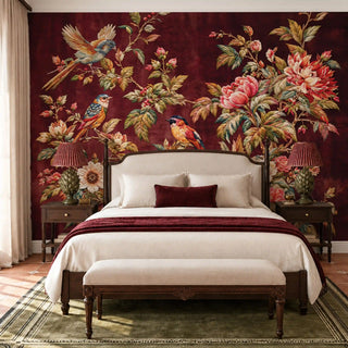 The Imperial Garden wallpaper mural in burgundy behind a dark wood bed with cream linen, songbirds and peonies spread across the wall view-bedroom