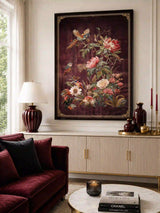 The Imperial Garden wall art in a dark frame above a cream fluted sideboard with burgundy vases, beside a burgundy sofa.