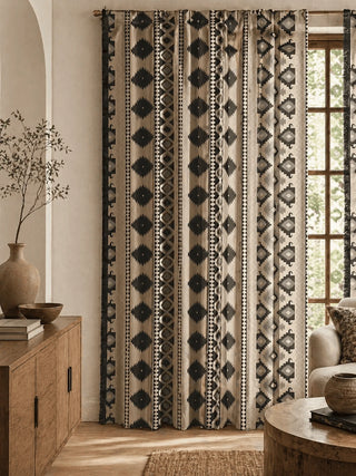Indian Ikkat Patterned curtains in a living room with wooden furniture and decor.
