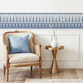 Indigo Grove Wallpaper: View of the border as a horizontal panel above a chair rail with a neutral bench.