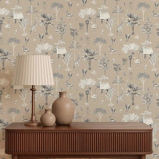 Full wall view of the Itihaas beige wallpaper with Indian elephants and animals in a modern room setting.