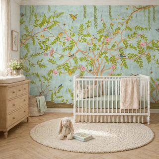 Nursery room with floral jannat wallpaper, crib, and wooden dresser. view-kids