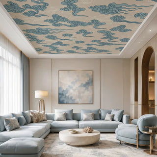 The Japanese Cloud Abstract blue and beige ceiling wallpaper mural styled inside a luxury modern living room with a large powder-blue sectional sofa view-ceiling