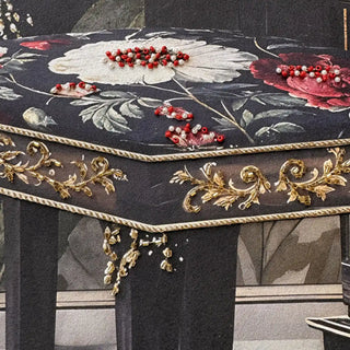 Close-up of the red and white beaded floral accents on the upholstered piano stool in the Jungle Noir masterpiece.