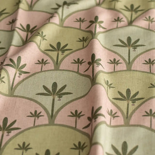 A draped view of the Kannan textile showing the soft weave and rhythmic geometric palm print in pastel tones.