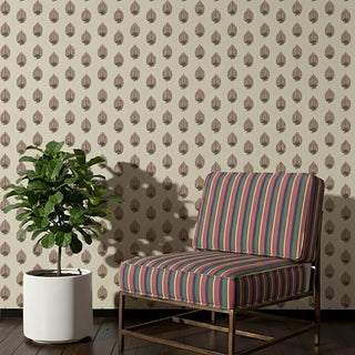 Kara Sofa and Chair Upholstery Fabric in multicolor vertical stripes, styled on a lounge chair.