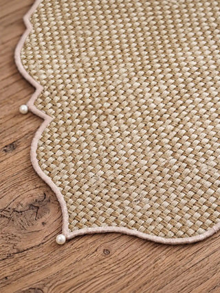 Detailed macro shot of Kasbah Pearl Jute runner showing the woven basketweave texture and pearl-accented scalloped edge.
