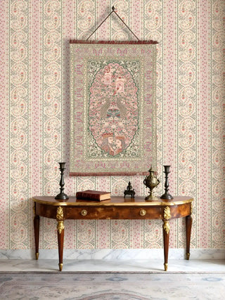 Embroidered Kashmiriyat tapestry layered over matching floral stripe wallpaper in a sophisticated foyer