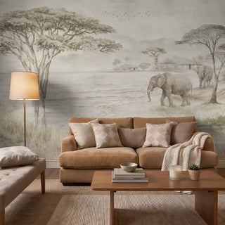A grand living space featuring the Kenya Grey wall mural behind a large cream sectional sofa and modern minimalist decor.