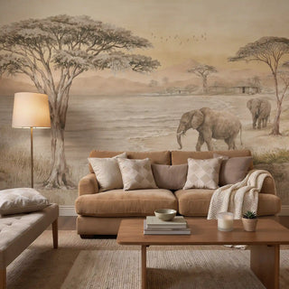 A luxury living room featuring the Kenya savannah mural in sepia behind a tan velvet sofa and modern coffee table.