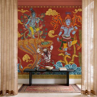 A wide view of the Keshava mural behind a sleek black console table with minimal decor in a luxury foyer.