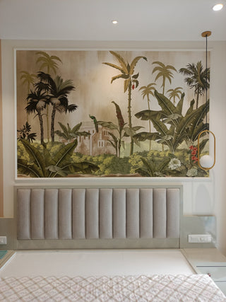 client testimonial: Tropical wallpaper above a bed with a neutral headboard.