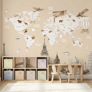 A sophisticated kids' bedroom featuring the Beige World Map Monuments mural next to a wooden shelf and activity table.