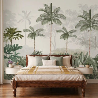 Kovalam tropical wallpaper in green with palms and banana leaves behind a carved dark wood bed with sage and gold bedding