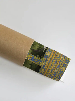 The Krishna with Gopies wall art carefully rolled in a protective kraft shipping tube.