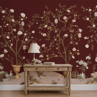 A room view of the Lantern Grove Chinoiserie Wallpaper in maroon, showing its detailed floral and botanical pattern across the wall.