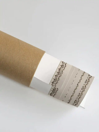 Close up of the Rajasthani Rajah print details showing the texture and rolled packaging in a shipping tube.