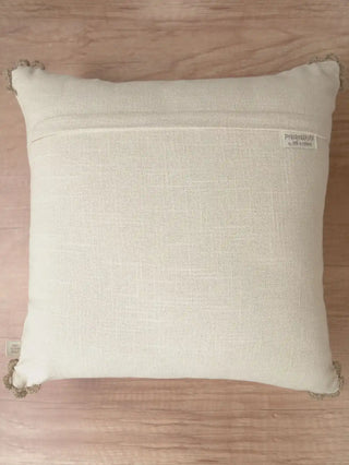 The reverse side view of the Linen Poet cushion cover showing the clean fabric backing, hidden zipper closure, and brand woven tag.