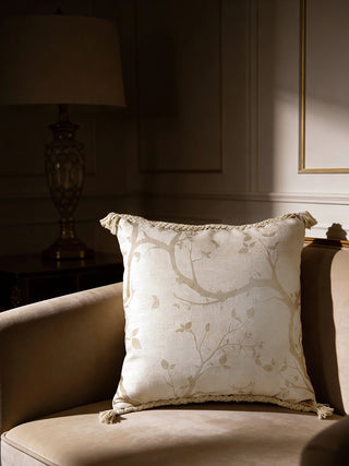 Close-up of the Echo Chinoiserie Braid cushion showing the hand-printed vine pattern and thick braided rope border.