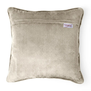 The reverse side of the Jhalak ivory velvet cushion cover showing the hidden zipper and brand tag.