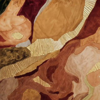 A close-up of the Magma in Ice wallpaper pattern in Molten Amber, showing gold textured veining between warm mineral-toned color fields.