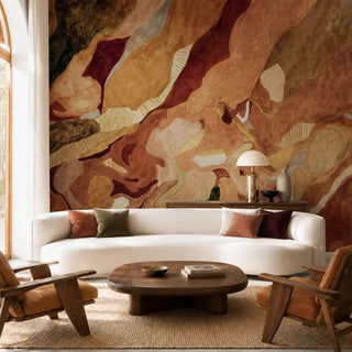 Magma in Ice wallpaper in Molten Amber behind a curved white sofa in a living room.