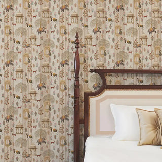 The Majestic Mewar beige wallpaper installed behind a carved wood four-poster bed frame with tan and cream cushions