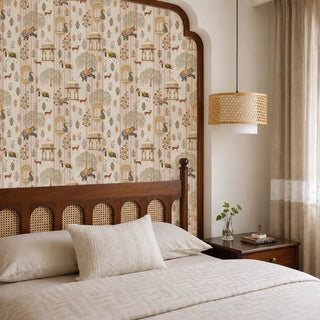 The Majestic Mewar beige wallpaper mural installed on a feature wall in a bedroom with a dark wood cane headboard and rattan pendant light view-bedroom