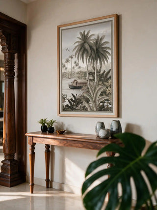 The Malabar Wall Art in Mist-Grey, framed and hung view-entryway beside a carved wooden pillar and console table.