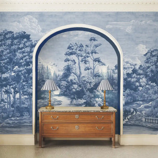 A section of the wallpaper highlighting the architectural details of a stone bridge surrounded by foliage, rendered in shades of blue.