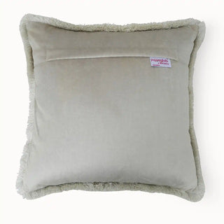 The back view of the Maya cushion cover showing the smooth premium velvet finish and brand label.