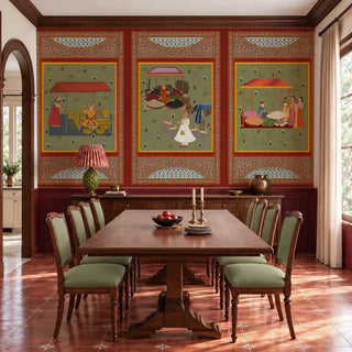 The Meena Bazar maroon wallpaper mural framing a dark wood dining table with sage-green upholstered chairs. view-dining