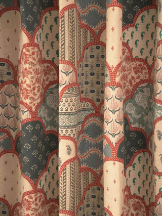 A high-resolution close-up of the patchwork ogee pattern, terracotta chain lines, and botanical motifs on the Mehr curtain.