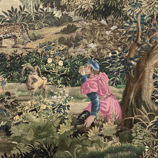 A close-up view showing detailed figures in pink attire, ornate floral motifs, and intricate greenery inspired by European tapestries.