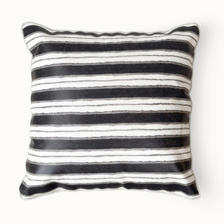 Front view of Midnight Linea cushion featuring organic black and white horizontal stripes.