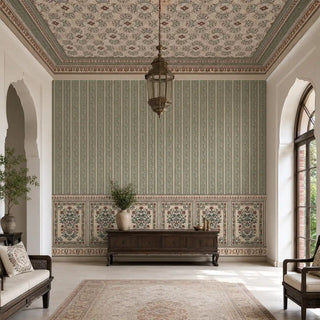 The Miras customized sage green wallpaper providing a structured, historic feature wall behind a dark wood console table in a luxury lounge.