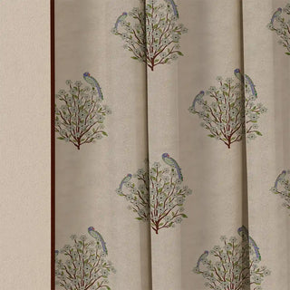 A detailed shot of the Mithoo Pipin curtain's fabric, showing the intricate details of the bird and floral motifs up close.