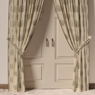The Mithoo Pipin curtain hanging, showing how it drapes elegantly in front of a doorway.