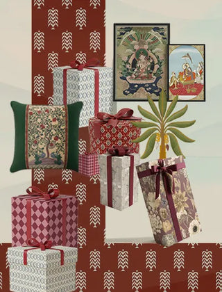 Decorative scene with patterned gifts, pillows, and wall art on a white background